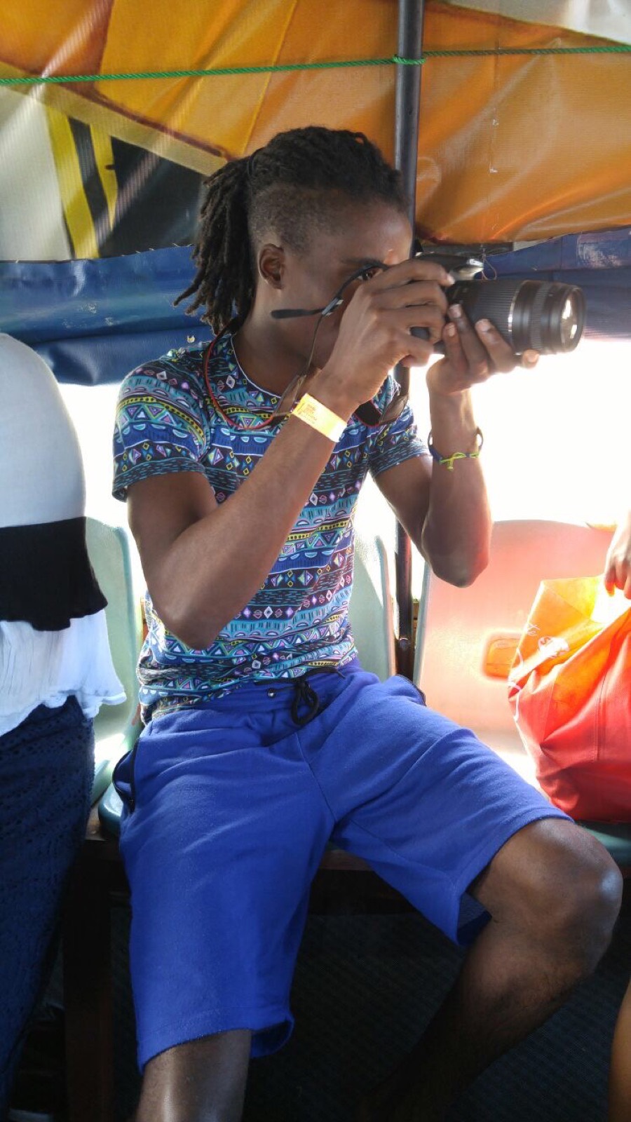 Malcolm J. Henry photographing while travelling